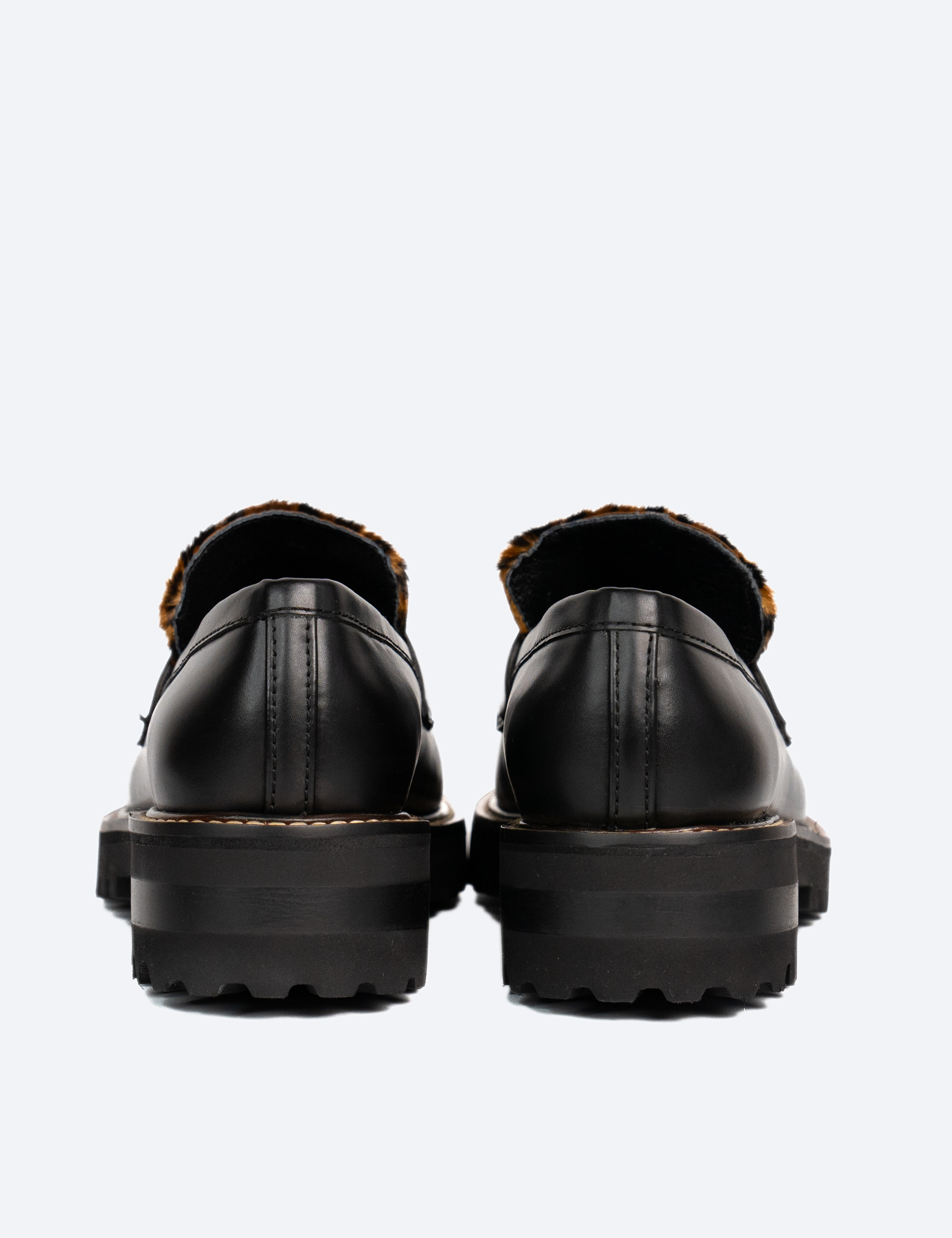 MOCASINES DONATO NEGRO CON ANIMAL PRINT